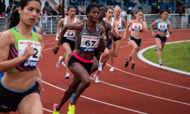 woman running competition